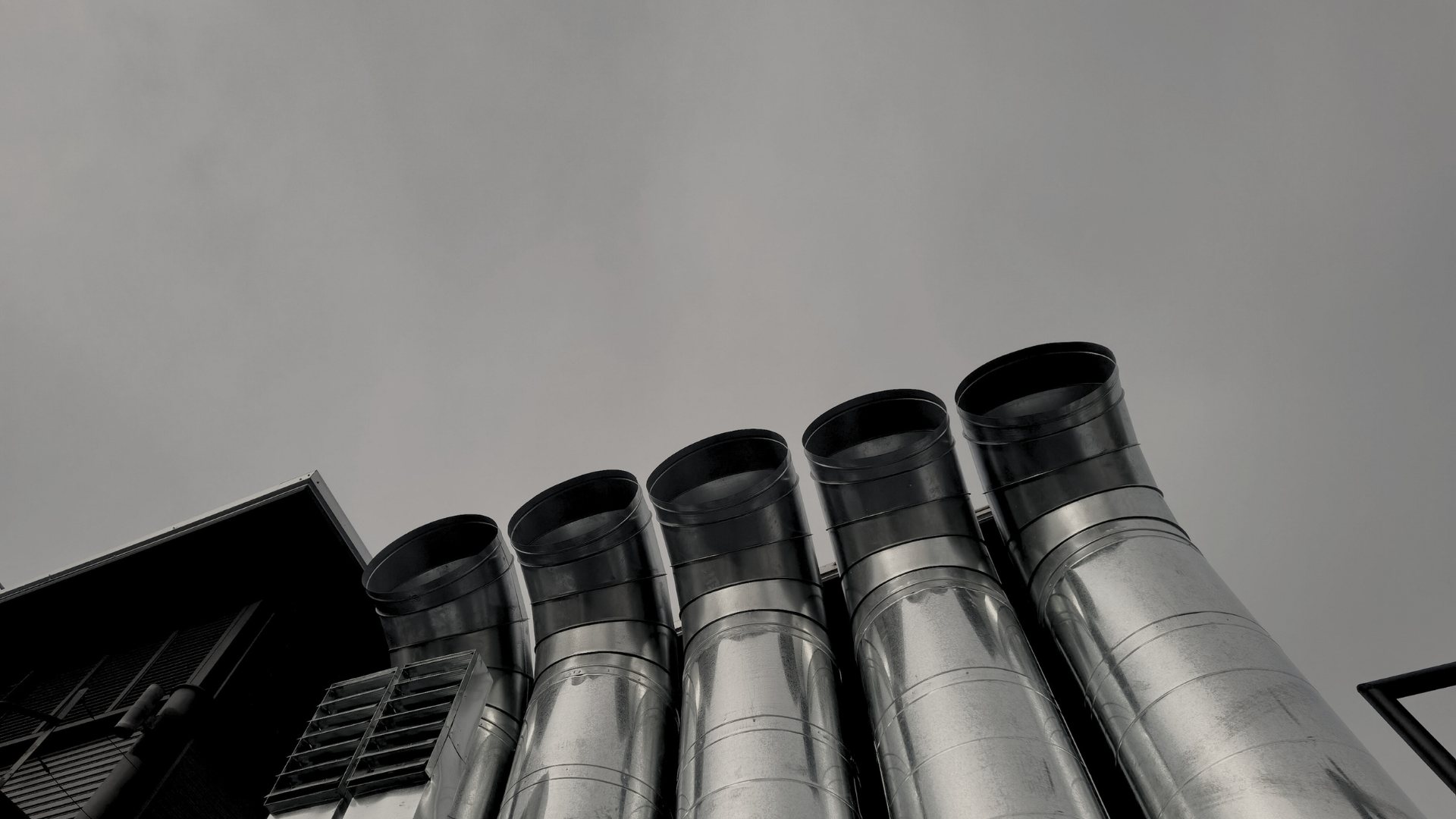 Row of heavy-duty exhaust stack pipes manufactured by 365 Manufacturing